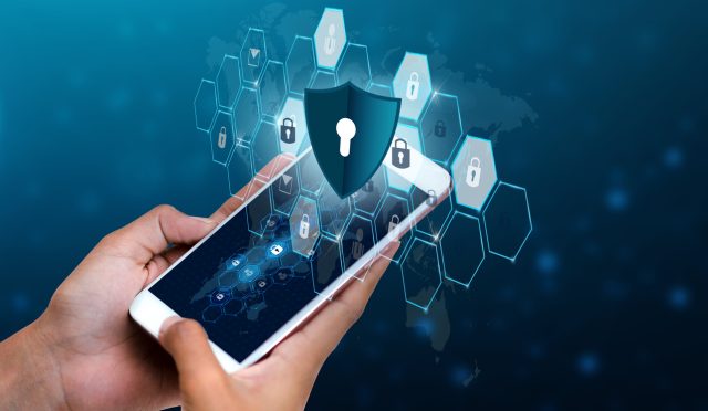 Unlocked smartphone lock Internet phone hand Business people press the phone to communicate in the Internet. Cyber security concept hand protection network with lock icon and virtual screens Space put message Blue tone