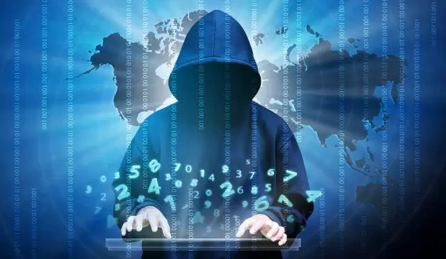 Computer hacker silhouette of hooded man